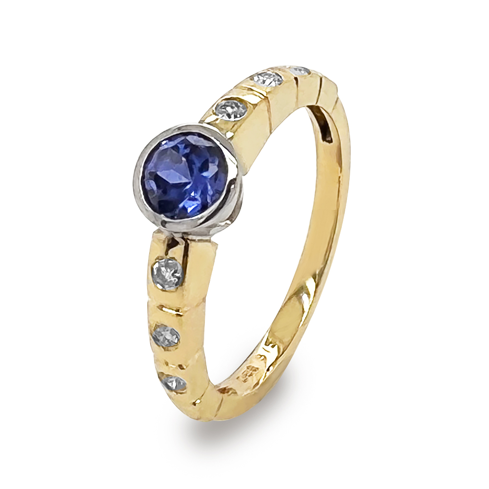 Bezel set Sapphire Ring with diamonds
