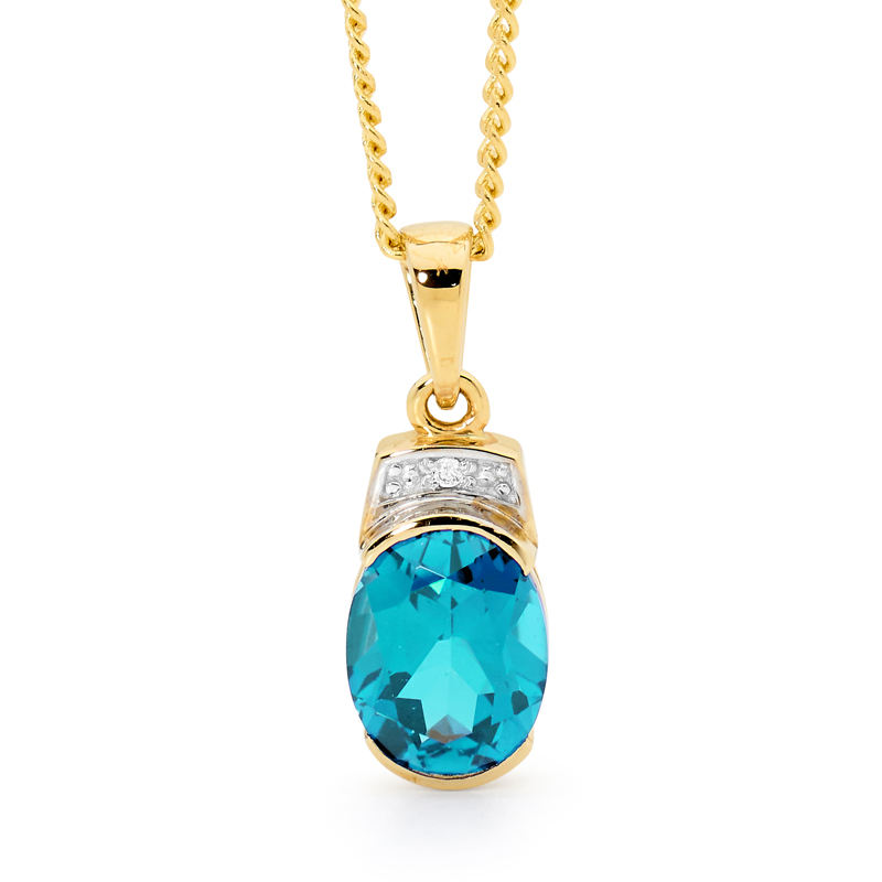 Oval Blue Topaz Pendant with Diamonds