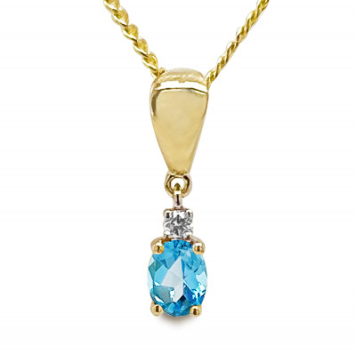 Blue Topaz and Diamond Pendant